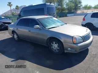 2003 Cadillac DeVille z VIN 1G6KD54Y13U105804, wystawiony jako IAAI lot #42471569 z przebiegiem 179 542 mil mil oraz . Historia ofert i sprzedaży dostępna na DreamBid. Obrazek 1.
