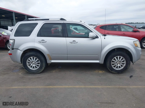 2010 Mercury Mariner Premier with VIN 4M2CN8H71AKJ14877, listed as a IAAI auction lot 41609202 with 232,706 mi miles. Bid and sale history available at carsss.com. Image 13.