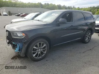 2014 Dodge Durango SXT with VIN 1C4RDJAG2EC323355, listed as a Copart auction lot 56679075 with 136,692 mi miles and Salvage title. Bid and sale history available at DreamBid. Image 1.