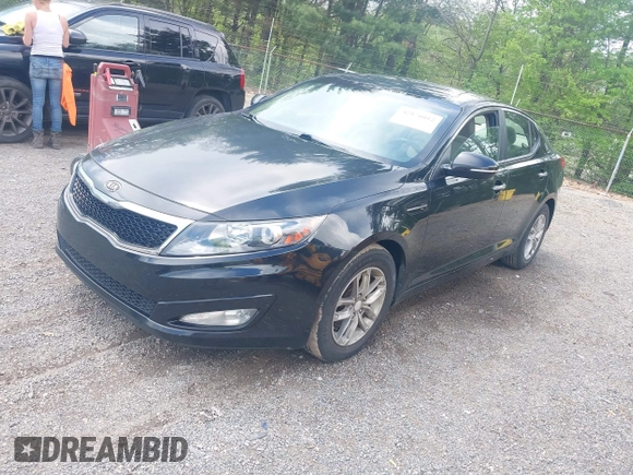 2012 Kia Optima LX with VIN KNAGM4A73C5287487, listed as a IAAI auction lot 42176012 with 233,460 mi miles and . Bid and sale history available at carsss.com. Image 2.