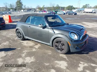 2014 MINI Convertible S with VIN WMWZP3C54ET706354, listed as a IAAI auction lot 41576316 with 56,780 mi miles and . Bid and sale history available at DreamBid. Image 1.