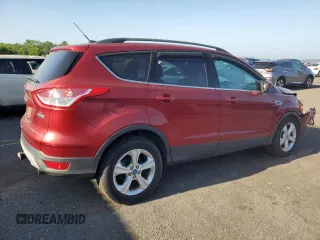 2013 Ford Escape SE with VIN 1FMCU0G97DUC07677, listed as a Copart auction lot 60247335 with 51,141 mi miles and Salvage title. Bid and sale history available at DreamBid. Image 3.
