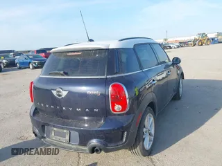 2013 MINI Countryman S ALL4 with VIN WMWZC5C58DWP33707, listed as a IAAI auction lot 41835234 with 98,441 mi miles and . Bid and sale history available at DreamBid. Image 4.