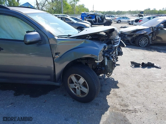 2007 Mitsubishi Outlander LS with VIN JA4MT31XX7U004009, listed as a IAAI auction lot 42006069 with 222,768 mi miles. Bid and sale history available at carsss.com. Image 6.