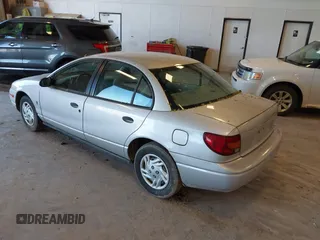 2001 Saturn SL z VIN 1G8ZF52841Z208220, wystawiony jako IAAI lot #42288195 z przebiegiem Nie podano mil oraz . Historia ofert i sprzedaży dostępna na DreamBid. Obrazek 3.