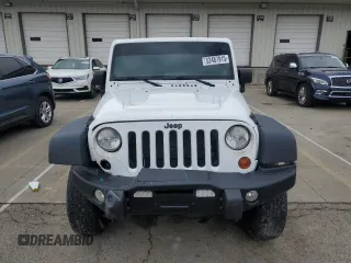 2013 Jeep Wrangler Unlimited Moab with VIN 1C4BJWEG6DL583841, listed as a Copart auction lot 52487915 with 130,369 mi miles and Salvage title. Bid and sale history available at DreamBid. Image 5.
