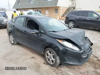 2015 Ford Fiesta SE z VIN 3FADP4BJ5FM122794, wystawiony jako IAAI lot #42056993 z przebiegiem 108 415 mil mil oraz . Historia ofert i sprzedaży dostępna na DreamBid. Obrazek 1.