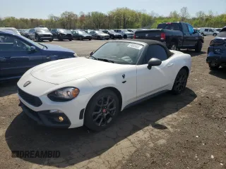 2017 FIAT 124 Spider Lusso z VIN JC1NFAEK5H0127954, wystawiony jako Copart lot #54605855 z przebiegiem 56 492 mil mil oraz Szkoda całkowita • Salvage title. Historia ofert i sprzedaży dostępna na DreamBid. Obrazek 1.