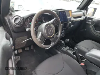 2013 Jeep Wrangler Sport with VIN 1C4AJWAG6DL576549, listed as a Copart auction lot 59888965 with 164,314 mi miles and Salvage title. Bid and sale history available at DreamBid. Image 8.