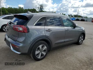 2017 Kia Niro Touring Launch Edition with VIN KNDCC3LC2H5037562, listed as a Copart auction lot 60726424 with 148,023 mi miles and Clean Title. Bid and sale history available at carsss.com. Image 3.
