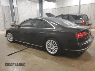 2015 Audi A8 4.0T z VIN WAUJ2AFD5FN009882, wystawiony jako Copart lot #84222704 z przebiegiem 56 118 mil mil oraz Czysty tytuł • Clean title. Historia ofert i sprzedaży dostępna na DreamBid. Obrazek 2.