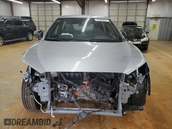 2024 Toyota Corolla Cross Hybrid S z VIN 7MUFBABG7RV035039, wystawiony jako Copart lot #56900825 z przebiegiem 6 331 mil mil oraz Szkoda całkowita • Salvage title. Historia ofert i sprzedaży dostępna na DreamBid. Obrazek 5.