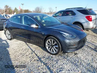 2020 Tesla Model 3 Long Range with VIN 5YJ3E1EB9LF795408, listed as a IAAI auction lot 41735428 with 56,013 mi miles. Bid and sale history available at carsss.com. Image 1.