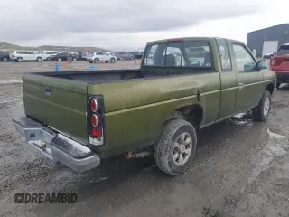 1996 Nissan Frontier XE with VIN 1N6SD16SXTC322219, listed as a Copart auction lot 49043685 with 102,964 mi miles and Salvage title. Bid and sale history available at DreamBid. Image 4.