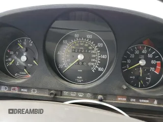 1987 Mercedes-Benz 560 SL z VIN WDBBA48D0HA061731, wystawiony jako Copart lot #56622425 z przebiegiem 121 214 mil mil oraz Czysty tytuł • Clean title. Historia ofert i sprzedaży dostępna na DreamBid. Obrazek 9.