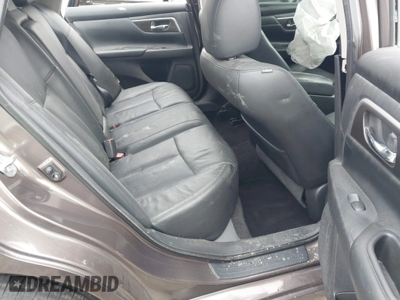 2014 Nissan Altima S with VIN 1N4AL3AP7EC185779, listed as a IAAI auction lot 41730487 with 112,503 mi miles and . Bid and sale history available at DreamBid. Image 8.