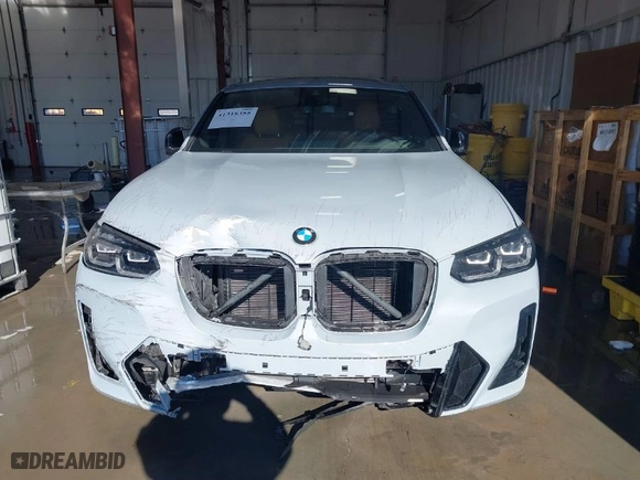 2023 BMW X4 M40i with VIN 5UX43DT03P9R26280, listed as a IAAI auction lot 41318355 with 21,587 mi miles. Bid and sale history available at carsss.com. Image 12.