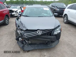 2014 Volkswagen Passat Wolfsburg Edition with VIN 1VWAT7A37EC102282, listed as a IAAI auction lot 42310561 with 113,374 mi miles and . Bid and sale history available at DreamBid. Image 13.