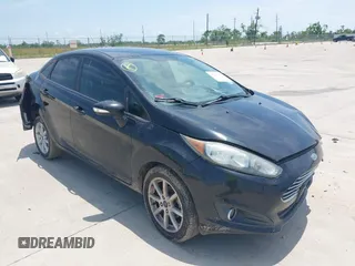 2017 Ford Fiesta SE z VIN 3FADP4BJ6HM132723, wystawiony jako IAAI lot #42221255 z przebiegiem 128 679 mil mil oraz . Historia ofert i sprzedaży dostępna na DreamBid. Obrazek 1.