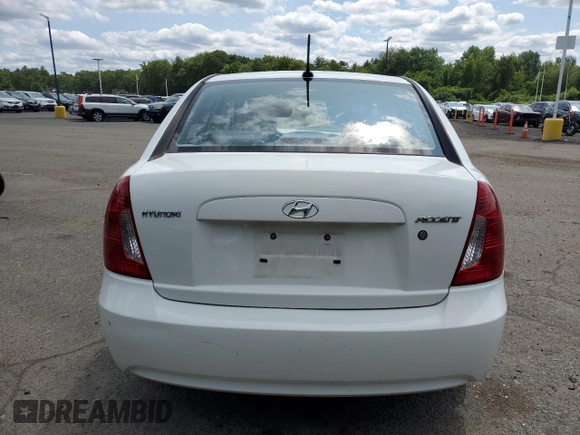 2011 Hyundai Accent GLS z VIN KMHCN4AC0BU603293, wystawiony jako Copart lot #58780435 z przebiegiem 55 222 mil mil oraz Szkoda całkowita • Salvage title. Historia ofert i sprzedaży dostępna na DreamBid. Obrazek 6.