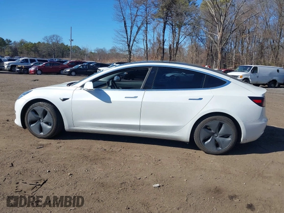 2020 Tesla Model 3 Standard Range Plus with VIN 5YJ3E1EA0LF783672, listed as a IAAI auction lot 41903431 with 52,157 mi miles and . Bid and sale history available at carsss.com. Image 14.