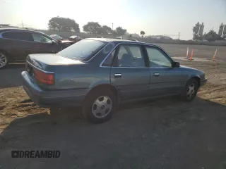 1992 Mazda 626 z VIN 1YVGD22B5N5212605, wystawiony jako Copart lot #74945704 z przebiegiem 99 659 mil mil oraz Tytuł czysty. Historia ofert i sprzedaży dostępna na DreamBid. Obrazek 3.