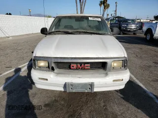 1995 GMC Sonoma with VIN 1GTCS14Z5S8536775, listed as a Copart auction lot 77086374 with 70,419 mi miles and Clean Title. Bid and sale history available at carsss.com. Image 5.