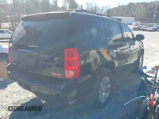 2008 GMC Yukon SLT w/4SB with VIN 1GKFC13058R146926, listed as a IAAI auction lot 41855642 with 207,257 mi miles. Bid and sale history available at carsss.com. Image 4.