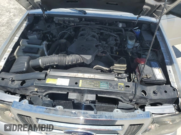2009 Ford Ranger XL z VIN 1FTYR15E99PA60348, wystawiony jako Copart lot #60277425 z przebiegiem 141 157 mil mil oraz Szkoda całkowita • Salvage title. Historia ofert i sprzedaży dostępna na DreamBid. Obrazek 11.