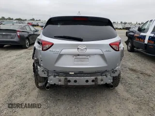 2016 Mazda CX-5 Touring with VIN JM3KE4CY6G0655381, listed as a Copart auction lot 53311445 with 145,513 mi miles and Salvage Title. Bid and sale history available at carsss.com. Image 6.