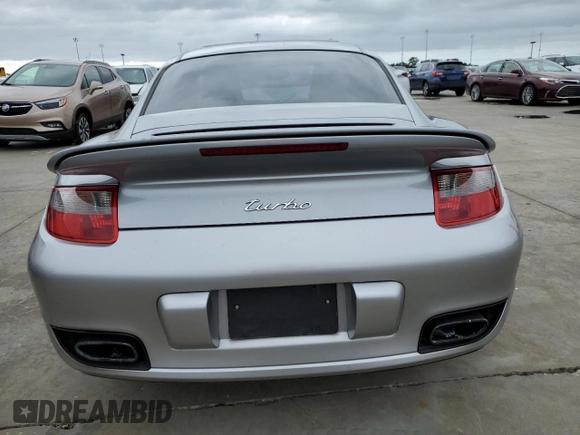 2007 Porsche 911 Turbo with VIN WP0AD29957S784485, listed as a Copart auction lot 75090564 with Not Provided miles and Salvage Title. Bid and sale history available at DreamBid. Image 6.