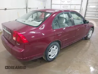 2002 Honda Civic LX with VIN 2HGES16512H513959, listed as a IAAI auction lot 42051292 with 137,656 mi miles and . Bid and sale history available at DreamBid. Image 4.