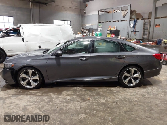 2019 Honda Accord Touring with VIN 1HGCV2F99KA031634, listed as a IAAI auction lot 41209019 with 74,965 mi miles and . Bid and sale history available at DreamBid. Image 14.