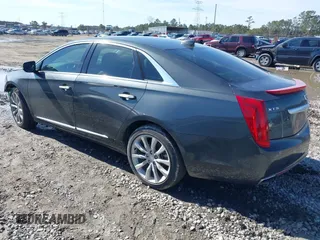 2017 Cadillac XTS Luxury with VIN 2G61M5S35H9139736, listed as a IAAI auction lot 41416683 with 119,907 mi miles. Bid and sale history available at carsss.com. Image 3.