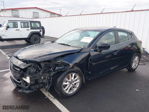 2016 Mazda Mazda3 i Grand Touring with VIN JM1BM1N74G1279692, listed as a IAAI auction lot 41164751 with 93,535 mi miles. Bid and sale history available at carsss.com. Image 2.