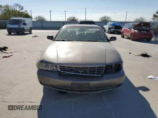 2003 Cadillac Seville Luxury SLS z VIN 1G6KS54Y93U279660, wystawiony jako Copart lot #75961404 z przebiegiem 107 591 mil mil oraz Szkoda całkowita • Salvage title. Historia ofert i sprzedaży dostępna na DreamBid. Obrazek 5.