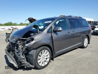 2014 Toyota Sienna XLE z VIN 5TDYK3DC7ES452163, wystawiony jako Copart lot #57534605 z przebiegiem 174 794 mil mil oraz Szkoda całkowita • Salvage title. Historia ofert i sprzedaży dostępna na DreamBid. Obrazek 1.