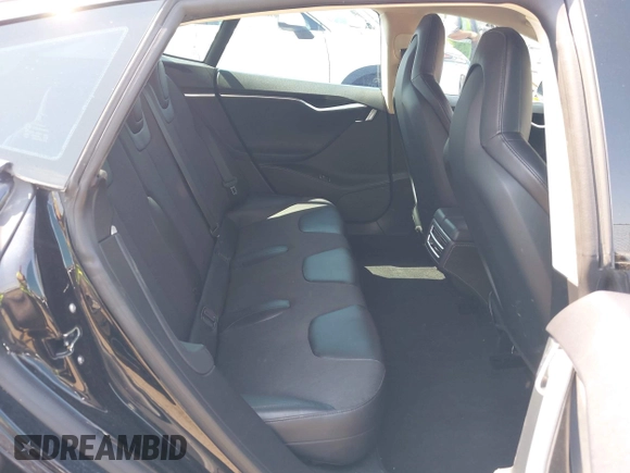 2013 Tesla Model S Performance with VIN 5YJSA1CP5DFP25346, listed as a IAAI auction lot 42463047 with 112,909 mi miles and . Bid and sale history available at DreamBid. Image 8.