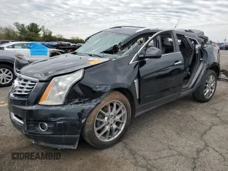 2014 Cadillac SRX Premium Collection z VIN 3GYFNGE31ES688270, wystawiony jako Copart lot #52795245 z przebiegiem 134 103 mil mil oraz Szkoda całkowita • Salvage title. Historia ofert i sprzedaży dostępna na DreamBid. Obrazek 1.