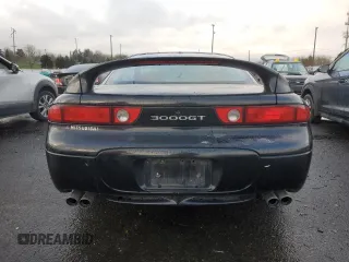 1998 Mitsubishi 3000GT GT z VIN JA3AM84J6WY002600, wystawiony jako Copart lot #86852624 z przebiegiem 141 204 mil mil oraz Tytuł czysty. Historia ofert i sprzedaży dostępna na DreamBid. Obrazek 6.