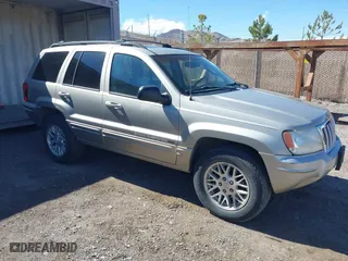 2004 Jeep Grand Cherokee Limited with VIN 1J8GW58N64C118464, listed as a IAAI auction lot 41763628 with 210,537 mi miles. Bid and sale history available at carsss.com. Image 1.