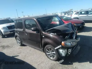 2010 Nissan Cube S z VIN JN8AZ2KR9AT160027, wystawiony jako IAAI lot #35562048 z przebiegiem Nie podano mil oraz . Historia ofert i sprzedaży dostępna na DreamBid. Obrazek 1.