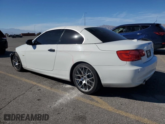 2013 BMW 3 Series 335i with VIN WBADX7C50DJ589769, listed as a Copart auction lot 77856914 with 143,235 mi miles and Salvage Title. Bid and sale history available at DreamBid. Image 2.