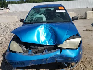 2007 Ford Focus S z VIN 1FAFP34N87W107744, wystawiony jako Copart lot #61934615 z przebiegiem Nie podano mil oraz Szkoda całkowita • Salvage title. Historia ofert i sprzedaży dostępna na DreamBid. Obrazek 13.