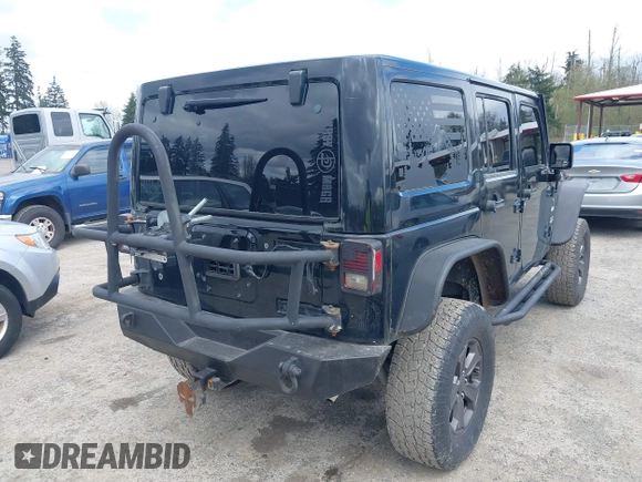 2014 Jeep Wrangler Unlimited Sahara with VIN 1C4BJWEG6EL107526, listed as a IAAI auction lot 42030244 with 69,077 mi miles. Bid and sale history available at carsss.com. Image 4.
