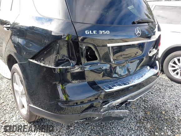 2016 Mercedes-Benz GLE 350 with VIN 4JGDA5JB5GA801020, listed as a IAAI auction lot 40442864 with 61,636 mi miles and . Bid and sale history available at DreamBid. Image 6.