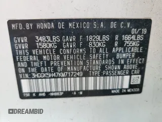 2019 Honda Fit LX with VIN 3HGGK5H47KM717249, listed as a Copart auction lot 61071025 with Not provided miles and Salvage title. Bid and sale history available at DreamBid. Image 12.