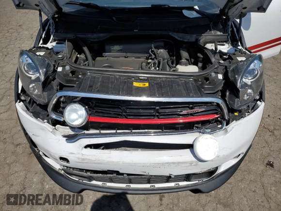 2015 MINI Countryman John Cooper Works with VIN WMWXD1C58FWS34860, listed as a Copart auction lot 55384065 with 48,709 mi miles and Salvage Title. Bid and sale history available at DreamBid. Image 11.