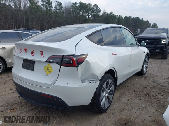 2023 Tesla Model Y Long Range with VIN 7SAYGDEE2PF765395, listed as a IAAI auction lot 41688080 with 27,792 mi miles and . Bid and sale history available at DreamBid. Image 4.