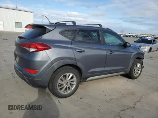 2017 Hyundai Tucson SE with VIN KM8J33A40HU330073, listed as a Copart auction lot 50713935 with 135,673 mi miles and Salvage Title. Bid and sale history available at DreamBid. Image 3.